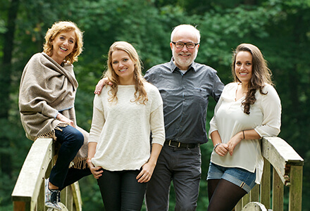 Family on wooded trail