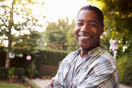 Man smiling after Glaucoma Surgery