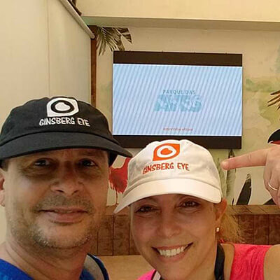 Man and woman take selfie wearing Ginsberg hats