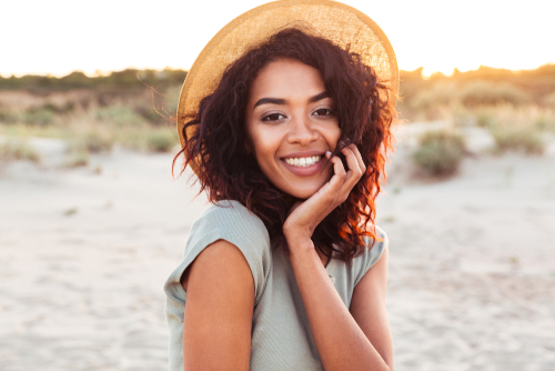 Young woman smiling after LASIK eye surgery